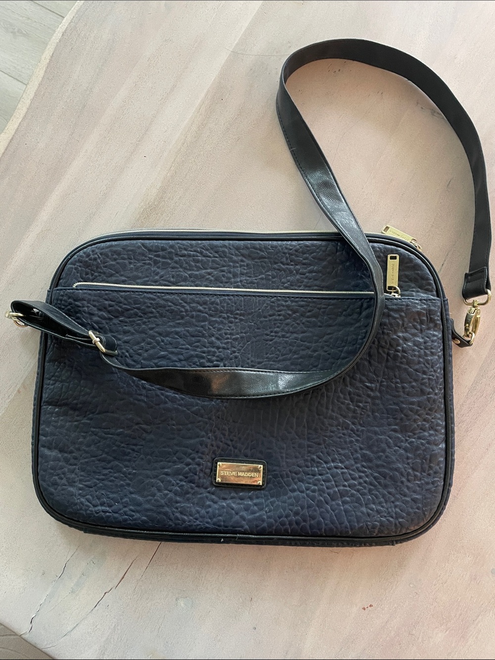 Steve Madden Navy Textured Leather Crossbody laptop bag with Gold Accents